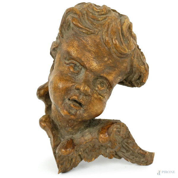 Antica testa di putto in legno scolpito ed intagliato, cm h 13,5, (difetti)