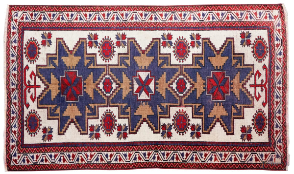 Tappeto caucasico, metà XX secolo, cm 184x112
