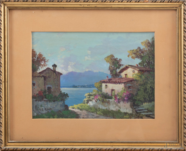 Scorcio di lago con case, XX secolo,  olio su cartone, cm 24x34, firmato in basso a sinistra, entro cornice