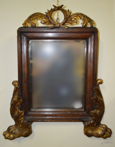 Specchiera di linea impero in legno intagliato con particolari dorati, h. cm 63x35.