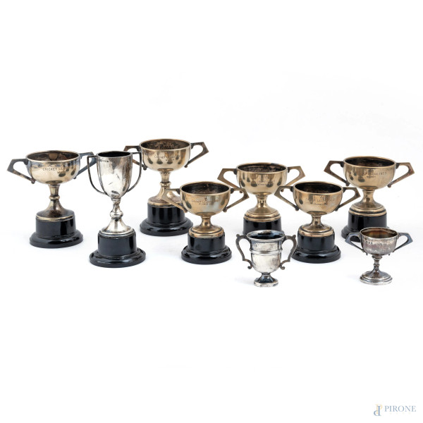 Lotto di nove coppette, 6 in EPNS e 3 in argento inglese, XX secolo, altezza massima cm 11, peso argento lordo gr 140, (segni di usura)