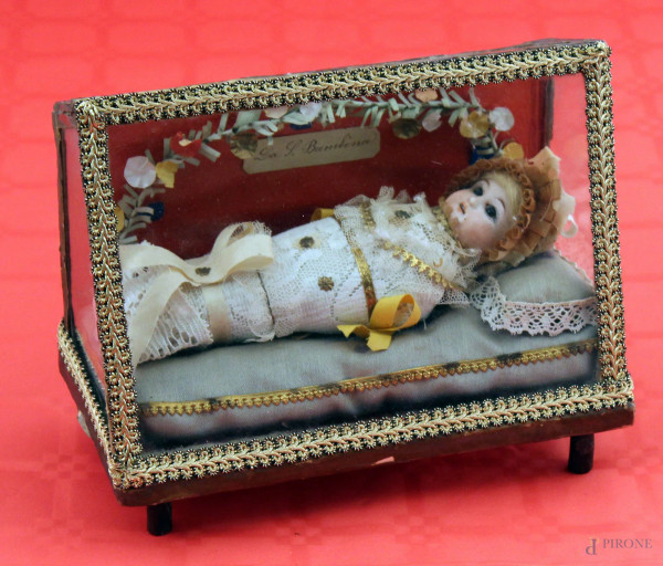 La Santa Bambina, Testa in porcellana, completo di teca, h. 18x21x11 cm