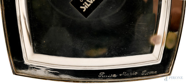 Lotto composto da 12 piattini in argento, XX secolo, cm 11x11, peso totale gr. 790