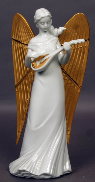 Angelo, scultura in porcellana bianca con particolari dorati, marcata Lladr&#242;, H 21 cm.