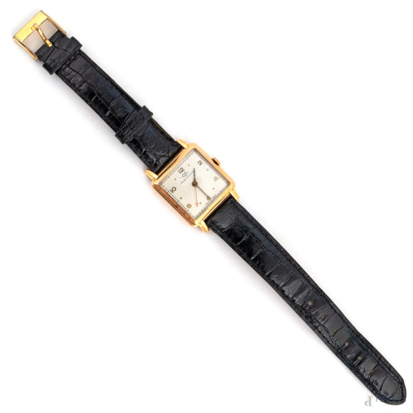 Orologio Movado con cassa in oro 18 kt, cassa cm 2,8x2,8, cinturino cm 21 (segni di usura, da revisionare)