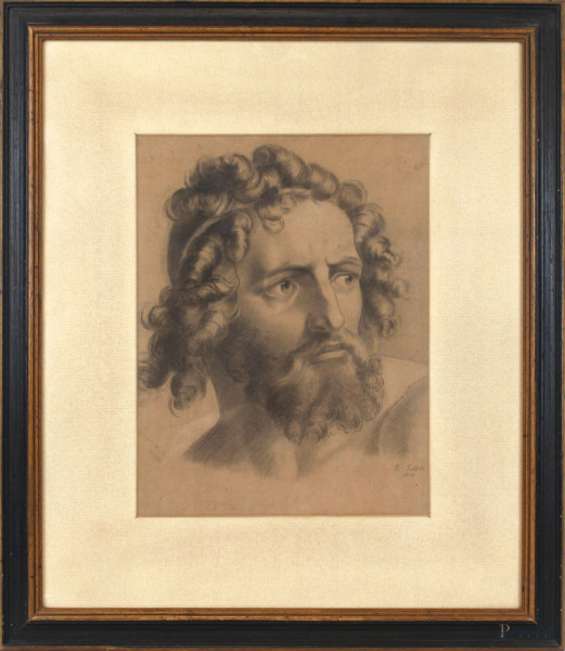 Volto d'uomo, disegno a matita su carta, cm 36x27, firmato e datato F.Saltelli 1873, entro cornice.