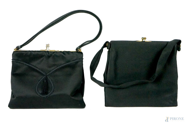 Lotto di due borsette nere in tessuto, chiusure a clutch, finiture in metallo dorato, misure max cm 18x18, (segni di utilizzo).