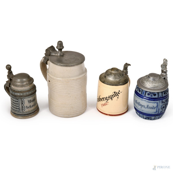 Lotto di quattro boccali in ceramica di varia foggia, XX secolo, altezza massima cm 14,5, (segni di usura)