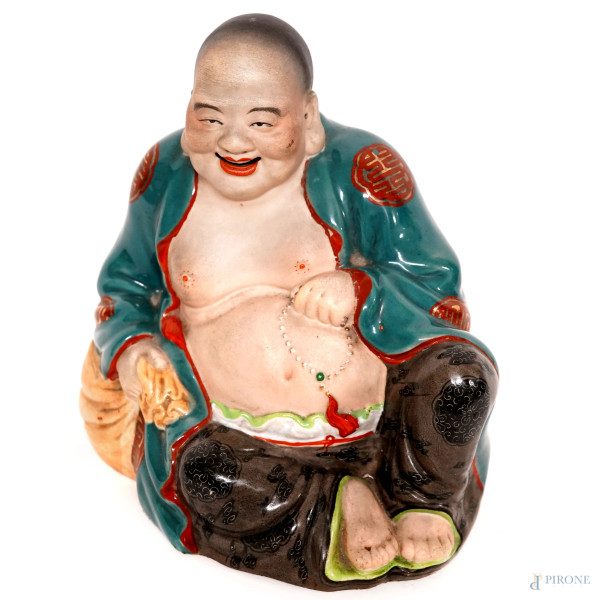 Scultura in porcellana smaltata raffigurante Buddha, XX secolo, cm 20x17x11, (difetti)