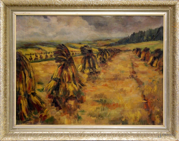Paesaggio con covoni di grano, olio su tela, cm. 80x60, entro cornice.