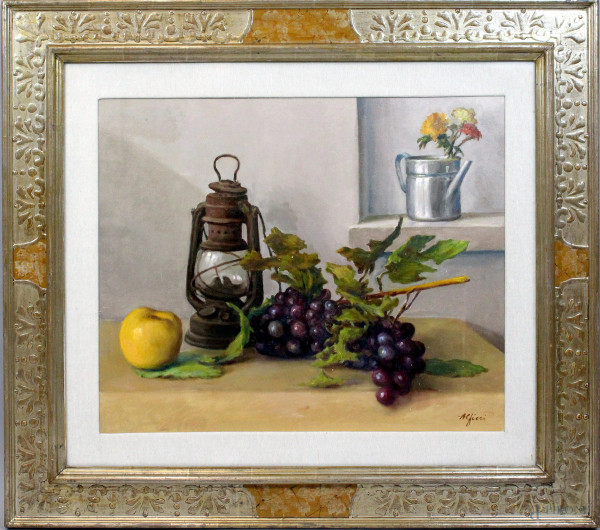Manlio Alfieri - Natura morta - lampada e grappoli d&#39;uva, olio su tela, cm. 50x60, datato 1976, entro cornice.