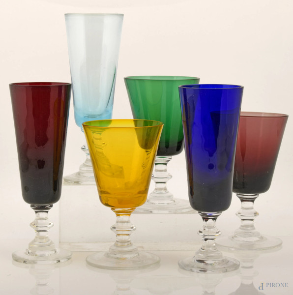 Lotto composto da 24 calici in vetro di vari colori, XX secolo, altezza cm 17,5, (difetti)