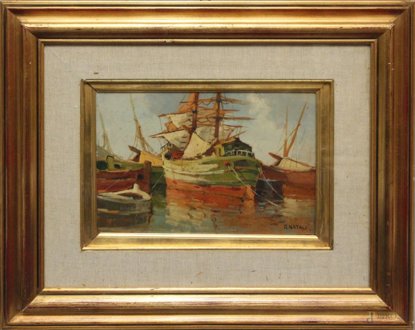 Porto con navi, olio su masonite, cm. 20x30, recante firma R. Natali, entro cornice.