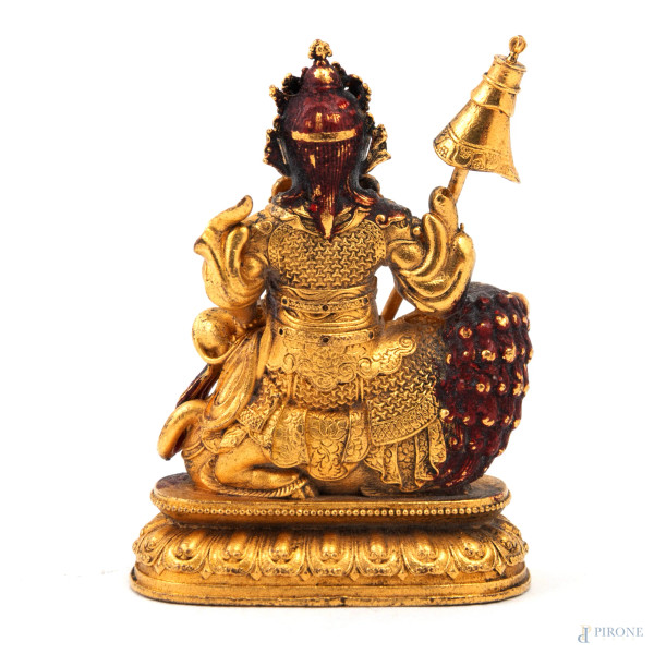 Sigillo in bronzo dorato con divinità orientale, XX secolo, altezza cm 4, (segni di usura)