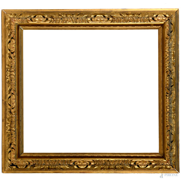 Cornice in legno intagliato e dorato, XX secolo, ingombro cm 64,5x70; luce cm 55x51