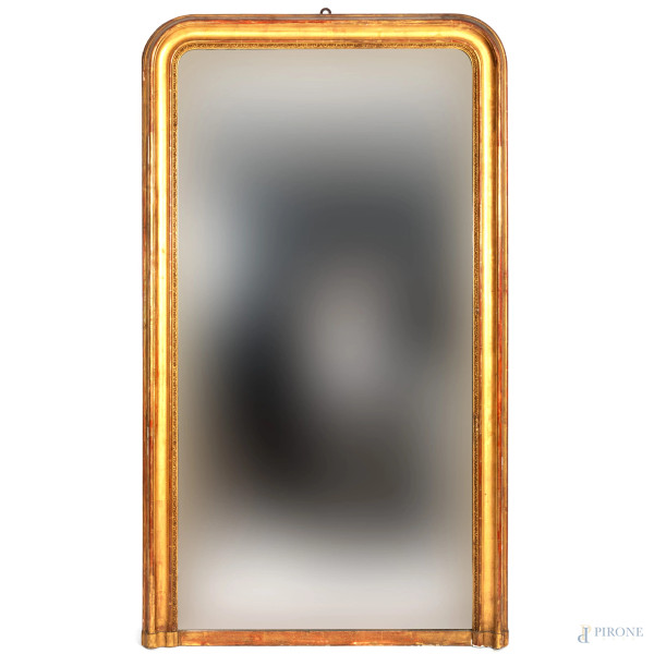 Specchiera in legno dorato e intagliato XX secolo, cm 171x99, (segni di usura, perdite di doratura, scalfiture, difetti)