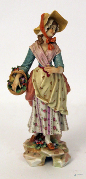 Ragazza con cesta di fiori, scultura in porcellana Maissen, h. cm 20, (difetti).