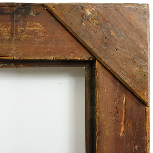 Cornice in legno scolpito e dorato, XIX secolo, ingombro cm 129x104, battente cm 101,5x78,5, (dif...