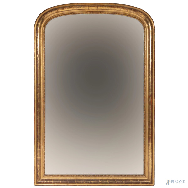 Specchiera in legno intagliata e dorata, XX secolo, cm 193x125, (segni di usura, scalfiture, cadute di doratura, difetti)