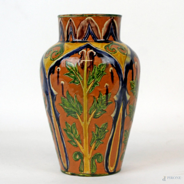 Vaso in ceramica smaltata e dipinta a motivi astratti e a foggia di rami con foglie, cm h 16, marchio alla base.