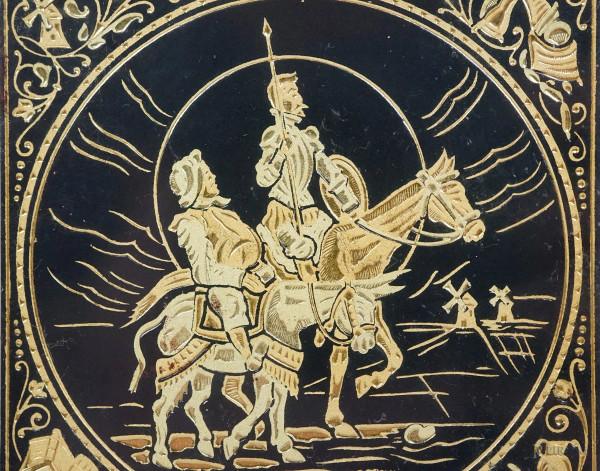 Don Chisciotte & Sancho Panza, placca in metallo con decoro dorato, cm 7x7, entro cornice.
