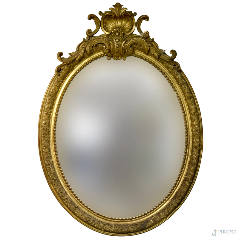 Specchiera di forma ovale in legno intagliato e dorato, inizi del XX secolo, cm 150x100, (difetti)   - Asta ASTA A TEMPO | VARIÆ - Aste Pirone