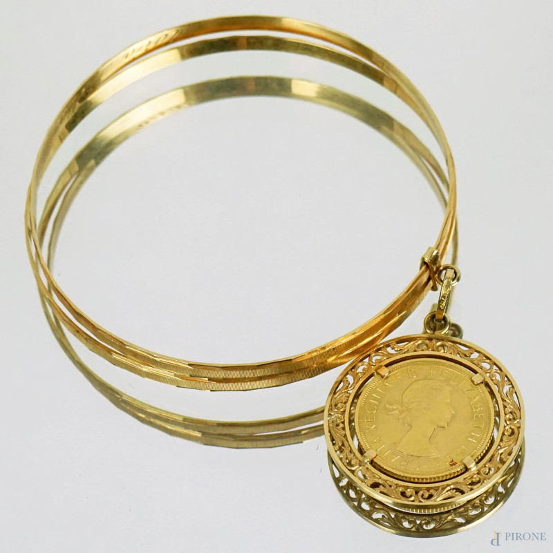 Doppio braciale rigido in oro giallo 18 KT con sterlina, peso tot gr.27,6  - Asta ASTA DI ANTIQUARIATO - Aste Pirone